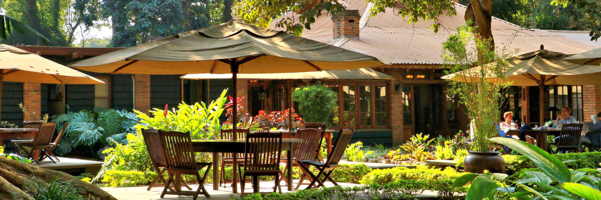 Arusha Coffee Garden aan de voet van Mount Meru ligt net buiten Arusha stad in Tanzania. Arusha Coffee Garden aan de voet van Mount Meru ligt net buiten Arusha stad in Tanzania.