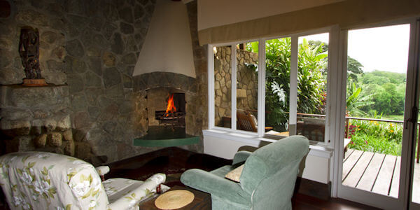 Gibb's Farm cottages met openhaard, Ngorongoro Krater in Tanzania Gibb's Farm cottages met openhaard, Ngorongoro Krater in Tanzania