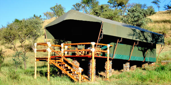 Grumeti Migration Camp exterieur standaardkamer, Serengeti Nationaal Park in Tanzania Grumeti Migration Camp exterieur standaardkamer, Serengeti Nationaal Park in Tanzania