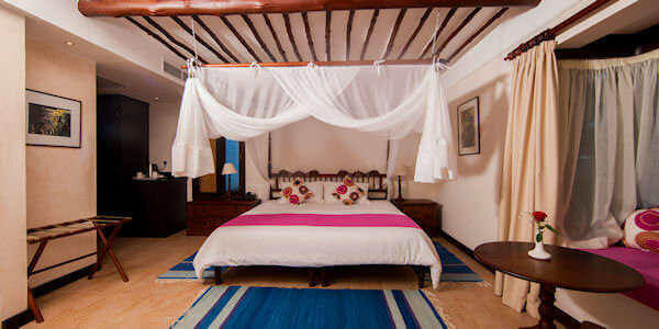 Indian Ocean Beach Resort accommodatie interieur tuinzicht kamer, Diani Beach in Kenia Indian Ocean Beach Resort accommodatie interieur tuinzicht kamer, Diani Beach in Kenia