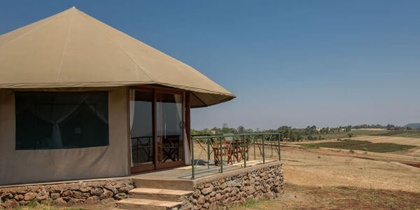 Karatu Simba Lodge - Ngorongoro Krater, Tanzania Karatu Simba Lodge - Ngorongoro Krater, Tanzania - Rondavel met terras