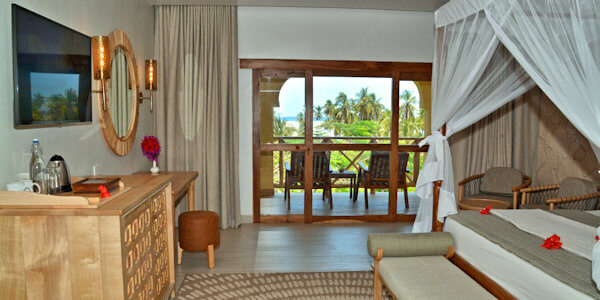 Neptune Pwani Beach Resort & Spa accommodatie interieur deluxe garden view, Zanzibar in Tanzania Neptune Pwani Beach Resort & Spa accommodatie interieur deluxe garden view, Zanzibar in Tanzania