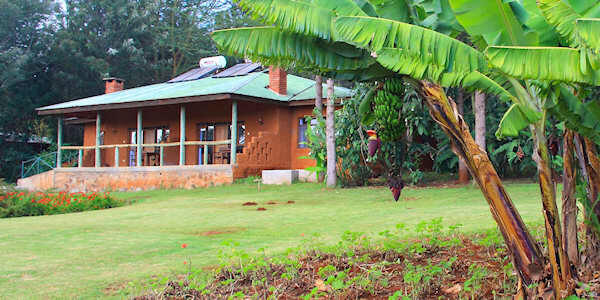 Ngorongoro Farm House accommodatie standaard kamer balkon, Ngorongoro Krater in Tanzania