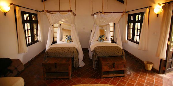 Rivertrees Country Inn accommodatie standaard cottage interieur, Arusha Nationaal Park in Tanzania Rivertrees Country Inn accommodatie standaard cottage interieur, Arusha Nationaal Park in Tanzania