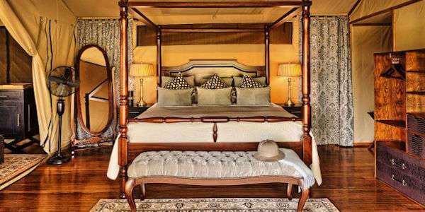 De safaritenten zijn rustiek ingericht in koloniale stijl. De safaritenten zijn rustiek ingericht in koloniale stijl, accommodatie Masai Mara in Kenia
