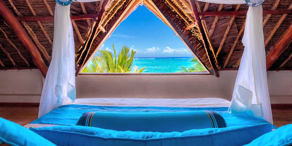 Waterlovers Beach Resort accommodatie penthouse suite slaapkamer, Diani Beach in Kenia
